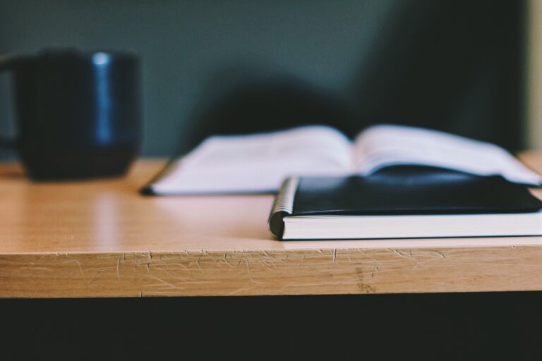 Notebooks and a Cup