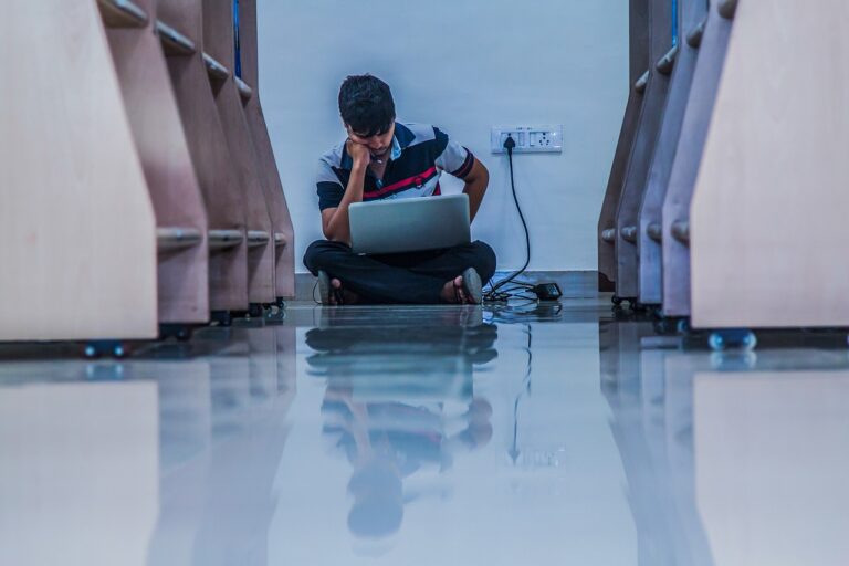 A Boy Using Laptop