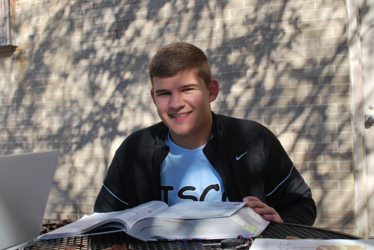 Smiling Boy With His Book